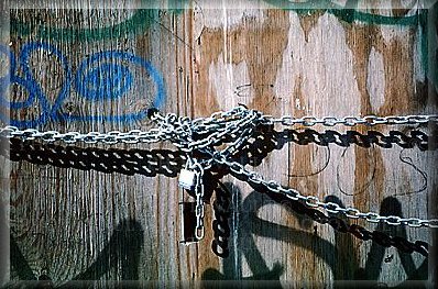 under lock & key...  tangled in links...